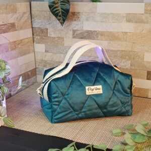 Trousse de toilette en velours matelassé bleu canard