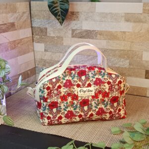 Trousse de toilette en tissu matelassé fleuri