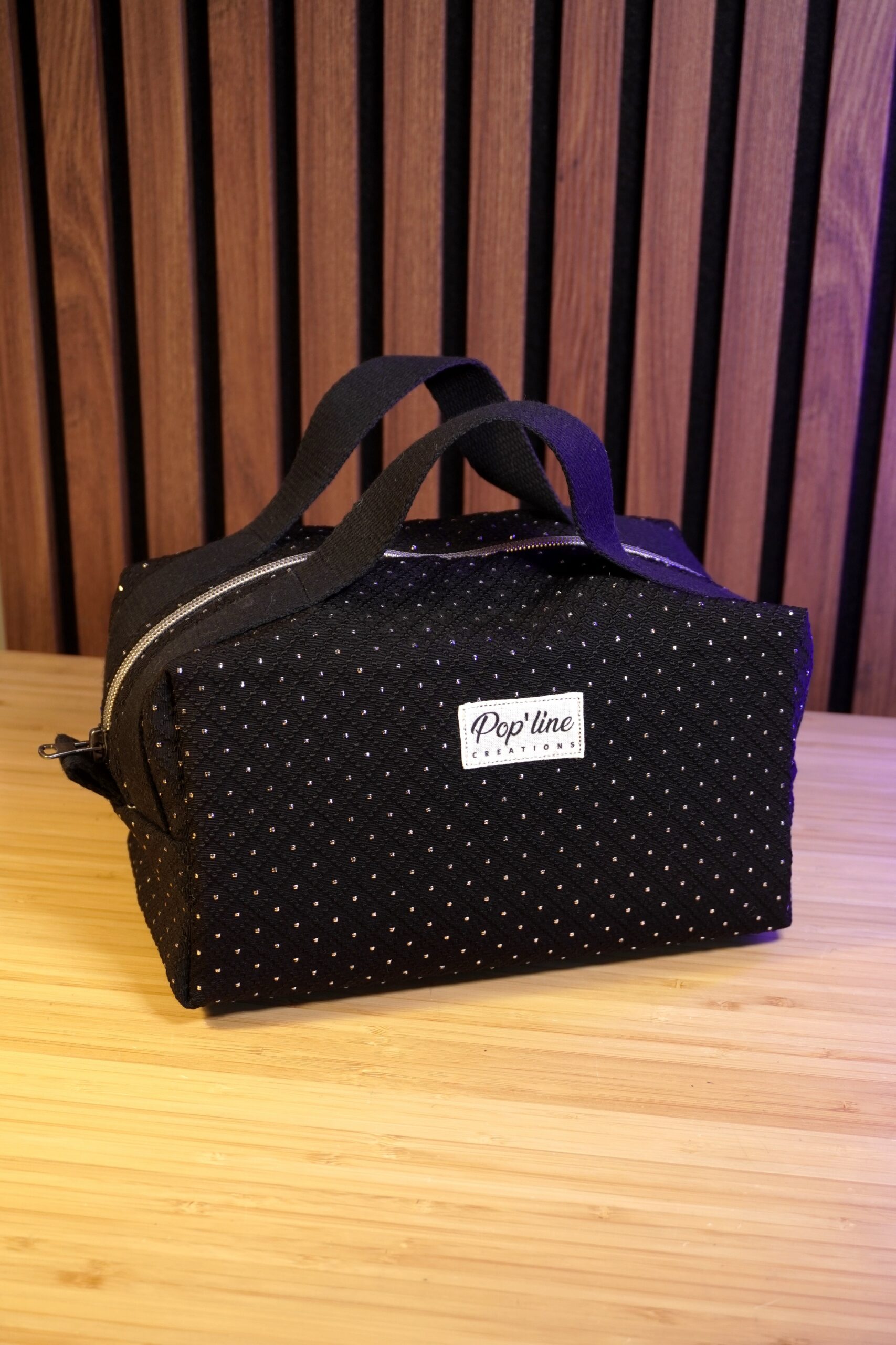 Trousse de toilette noire à paillettes